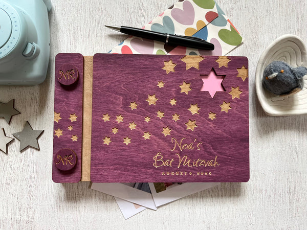 Purple book with star designs and personalized text made in wood for Bat or Bar Mitzvah