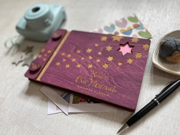 Purple book with star designs and personalized text made in wood for Bat or Bar Mitzvah