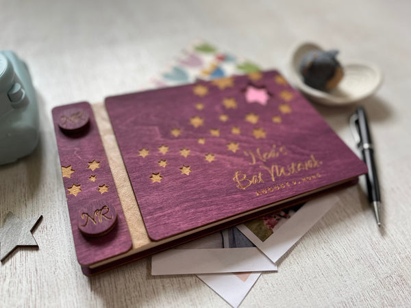 Purple book with star designs and personalized text made in wood for Bat or Bar Mitzvah