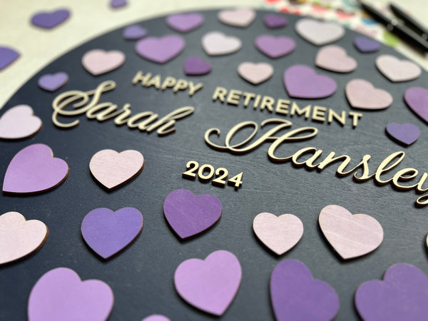 heart guest book personalized with the name of the retiree and year of retirement