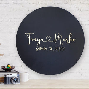 round guest book alternative sign with personalized names and wedding or anniversary date