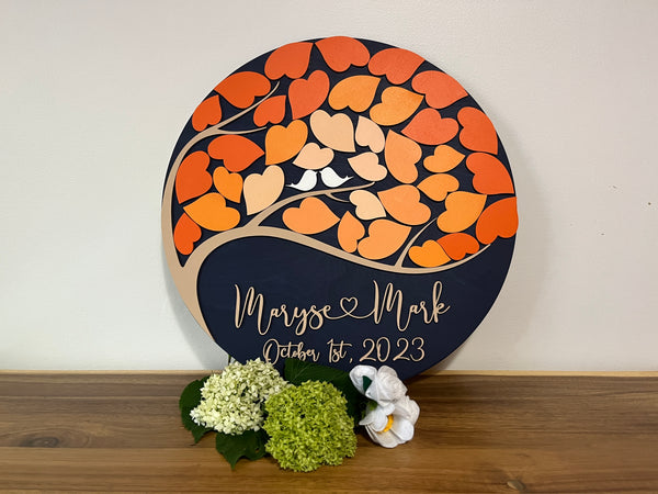 personalized wedding guest book with tree of life and orange fall colors
