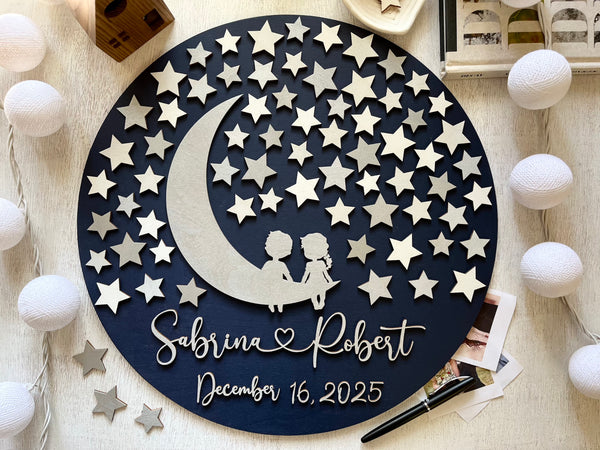 Decorative wall art with star pattern, couple silhouette, and personalized names and wedding date on a dark blue background.