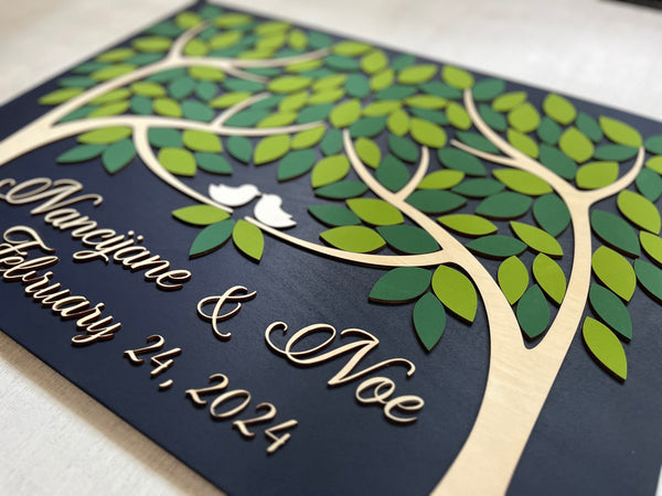 Two trees guest book alternative made of wood and personalized details with green shades for wedding
