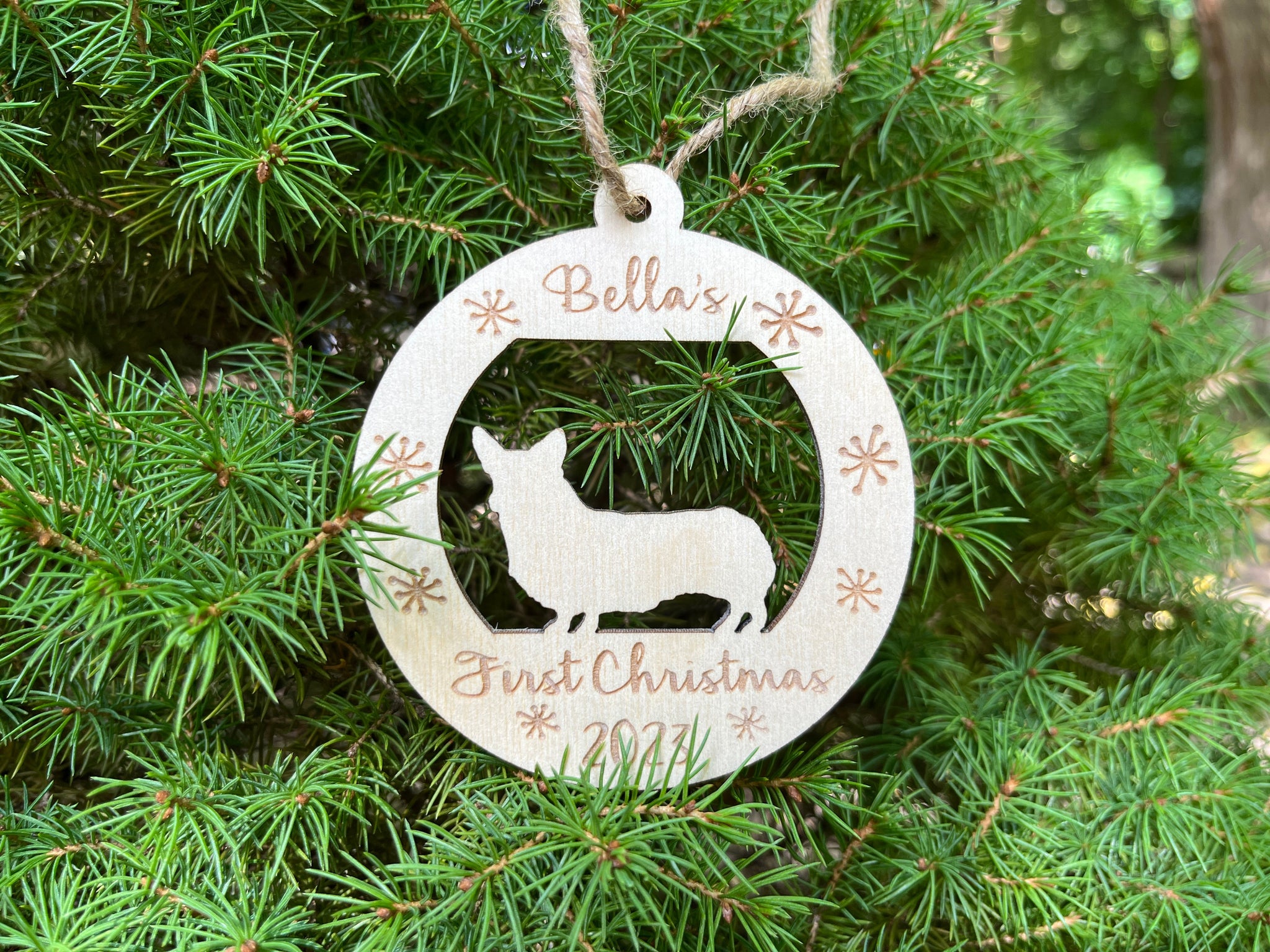 personalized puppy's first Christmas ornament round with a corgi dog silhouette