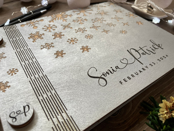 Classic guest book for winter wedding personalized with your names, wedding date and engraved snowflakes