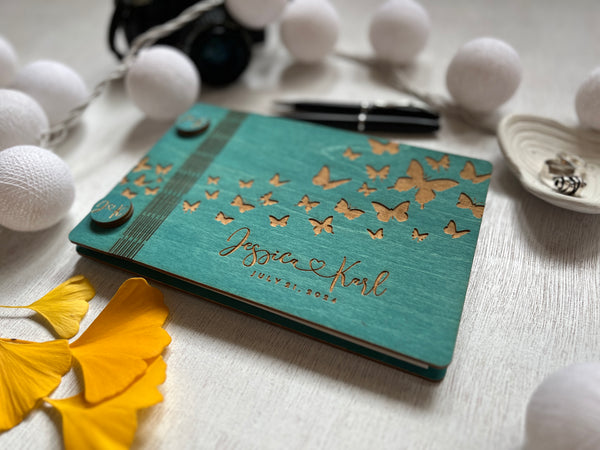 both covers of the guest book are made of wood and skillfully engraved with personalized details for a treasured wedding keepsake