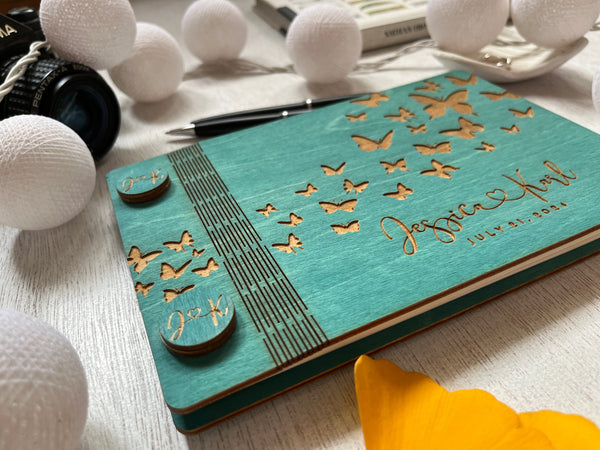 the cover is engraved with butterflies and  is made on a teal stain but other color options are also available