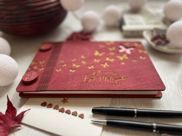 detail to show the calligraphic font that beautifully adorns the guestbook cover