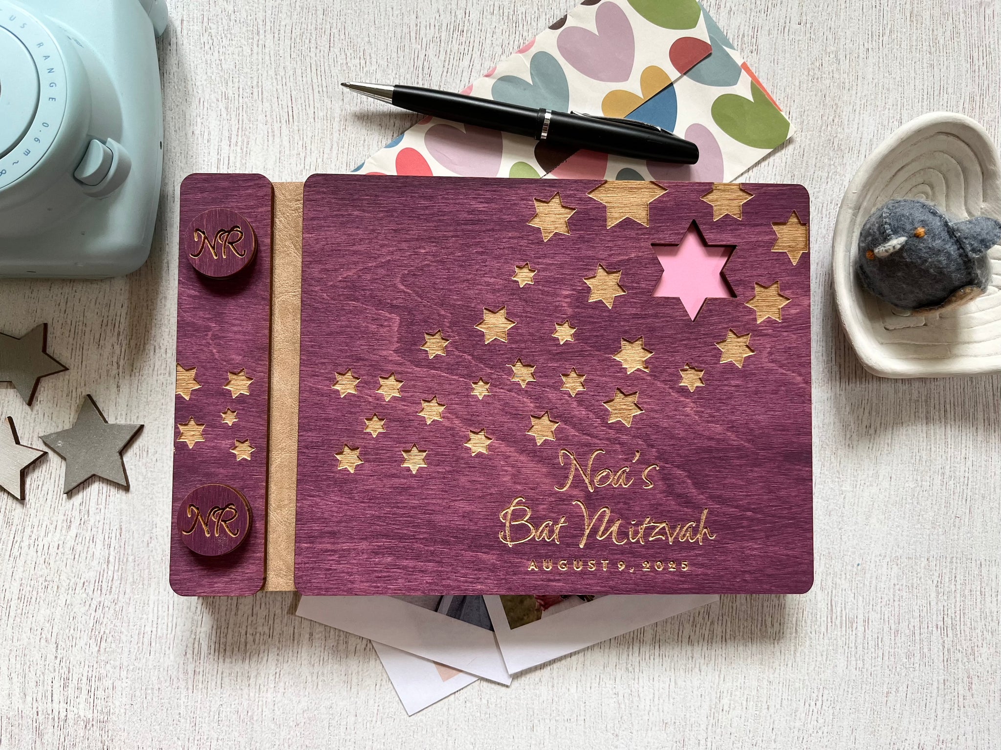 Purple book with star designs and personalized text made in wood for Bat or Bar Mitzvah