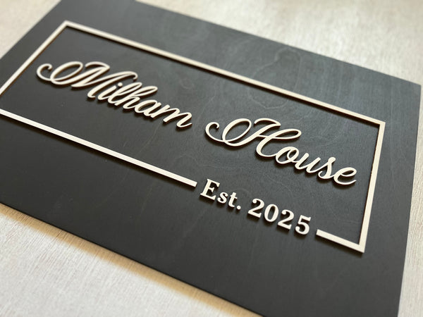 Decorative wood sign personalized with last names and 'Est. date' 