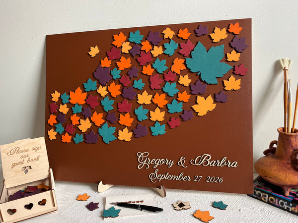 Personalized guest book with colorful leaf pattern on a brown background