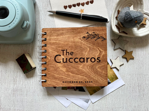 Wooden notebook with personalized last name and wedding date  engraved on it, used for wedding vows or couple adventure book