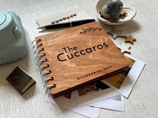 Wooden notebook with personalized last name and wedding date  engraved on it, used for wedding vows or couple adventure book