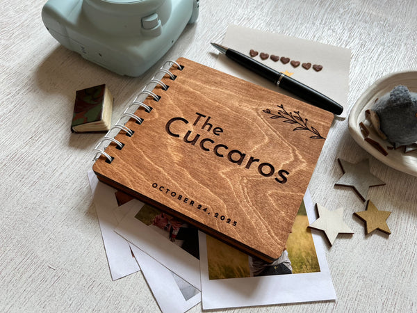 Wooden notebook with personalized last name and wedding date  engraved on it, used for wedding vows or couple adventure book