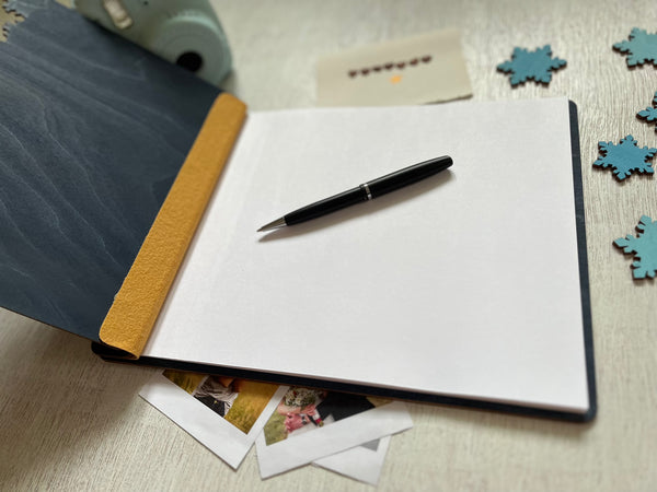 Notebook with wooden covers with pen personalized with engraved snowflakes on the front