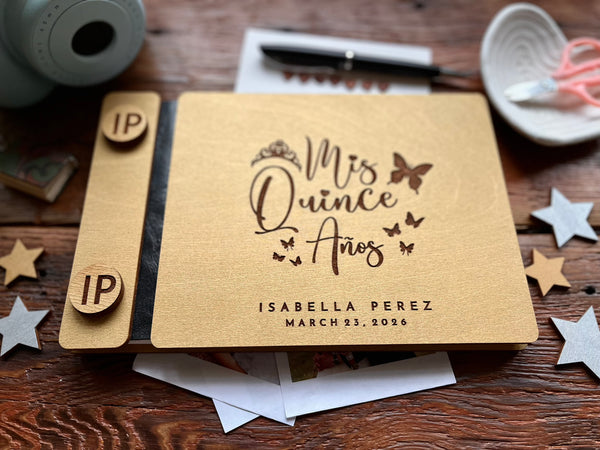 Personalized 'Mis Quince Años' guest book with golden covers
