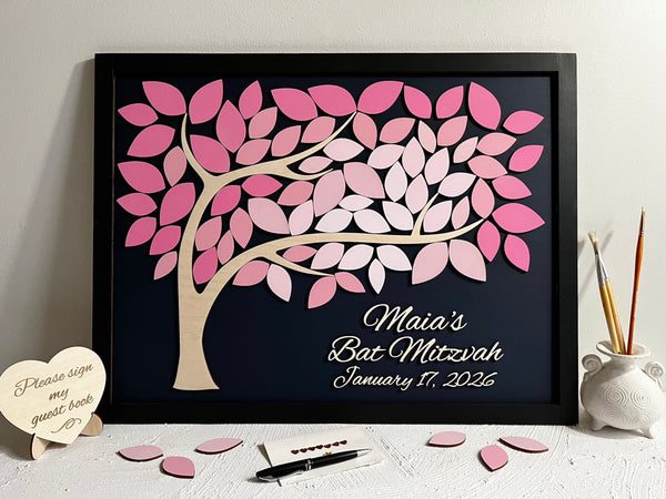 Decorative tree with pink leaves on a black background, featuring personalized text with a black frame