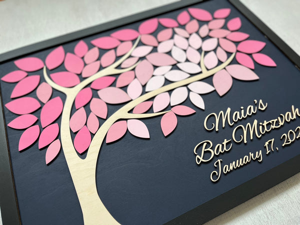 Decorative tree with pink leaves on a black background, featuring personalized text with a black frame