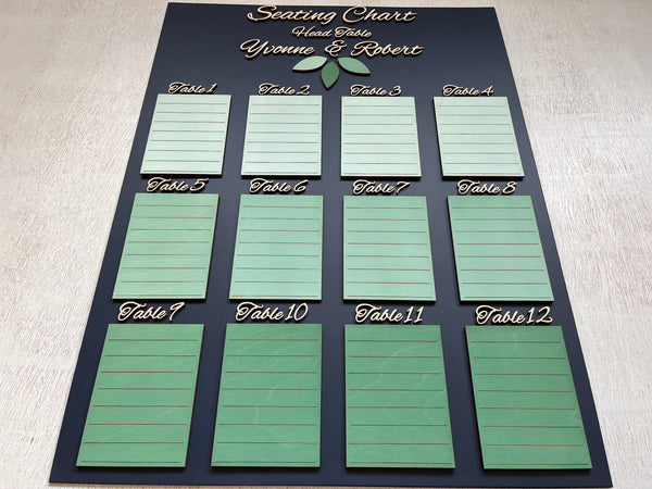 Table seating chart with green placeholders on a dark navy background