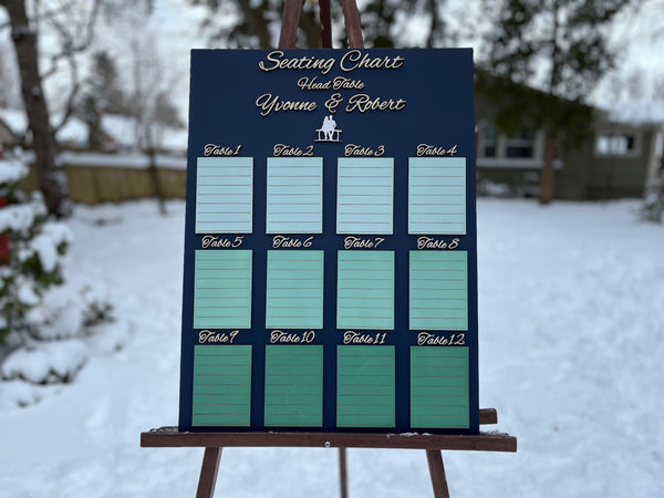 Seating chart on an easel outdoors in a snowy setting