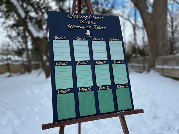 Seating chart on an easel outdoors in a snowy setting