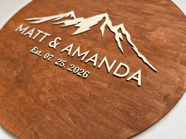 Wooden plaque with mountain design personalized names and established date  made for a wedding welcome sign