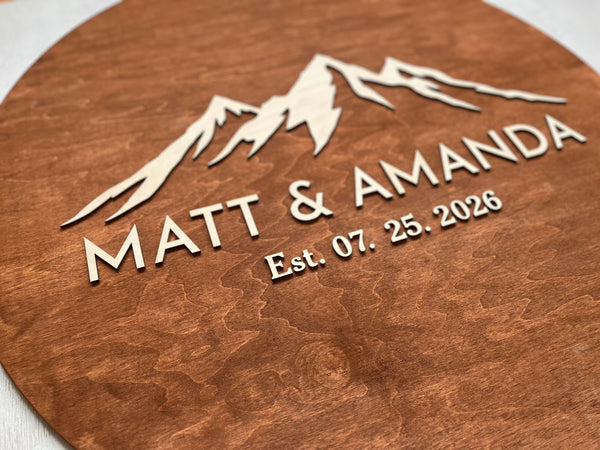 Wooden plaque with mountain design personalized names and established date  made for a wedding welcome sign