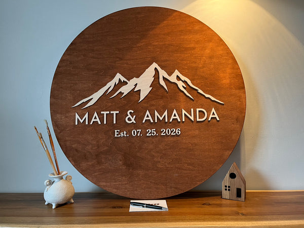 Wooden plaque with mountain design personalized names and established date  made for a wedding welcome sign
