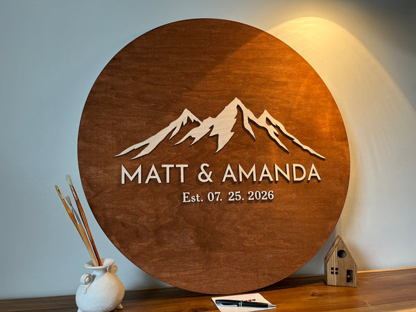 Wooden plaque with mountain design personalized names and established date  made for a wedding welcome sign