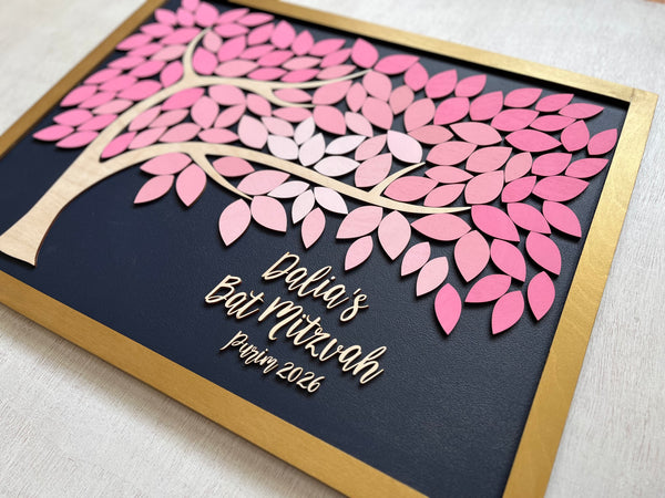 framed guest book alternative made for Bat Mitzvah featuring a tree with leaves to sign. The leaves are magnetic and removable from the magnetic background. 