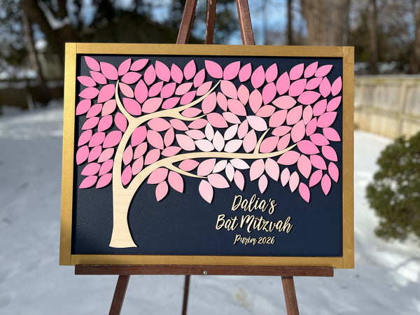framed guest book alternative made for Bat Mitzvah featuring a tree with leaves to sign. The leaves are magnetic and removable from the magnetic background. 