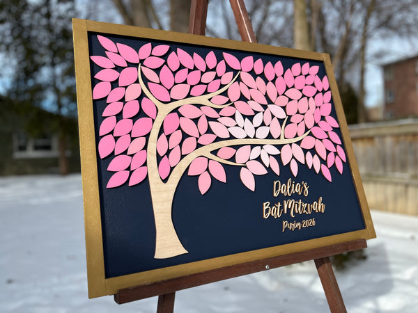 framed guest book alternative made for Bat Mitzvah featuring a tree with leaves to sign. The leaves are magnetic and removable from the magnetic background. 