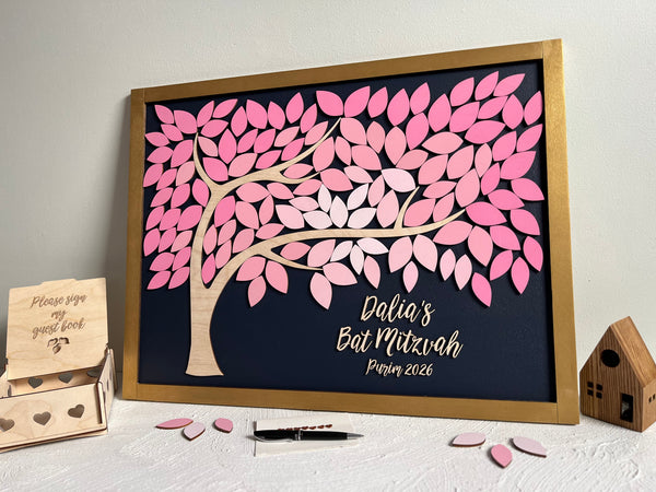 framed guest book alternative made for Bat Mitzvah featuring a tree with leaves to sign. The leaves are magnetic and removable from the magnetic background. 