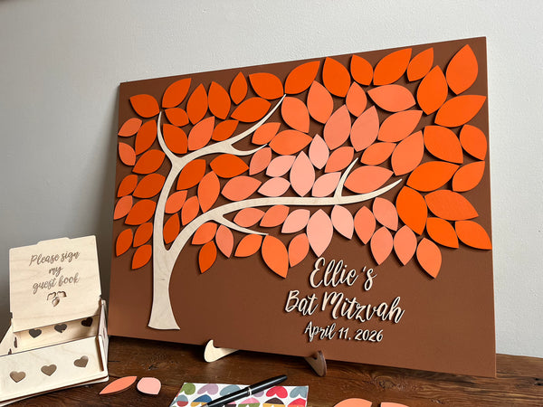 Customized Bat Mitzvah guest book with leaf design with magnetic leaves in orange shades and personalized text