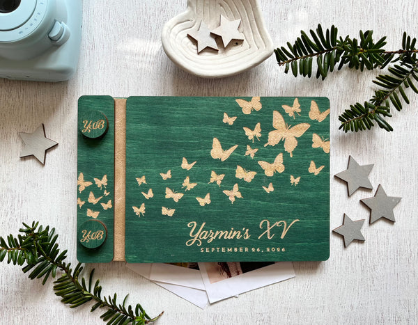 Butterfly personalized guest book for a quinceanearas party engraved with a name and birthday 