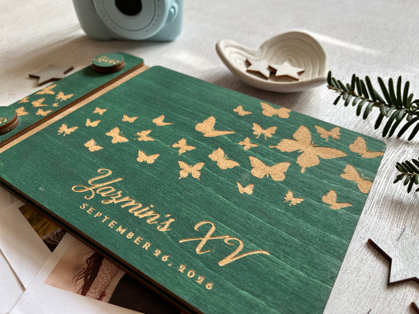 Butterfly personalized guest book for a quinceanearas party engraved with a name and birthday 