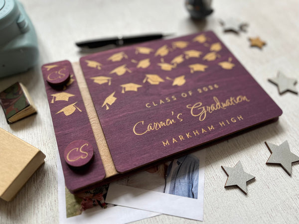 Graduation-themed notebook with caps design on a purple background, personalized with a name, school and Class of 2026