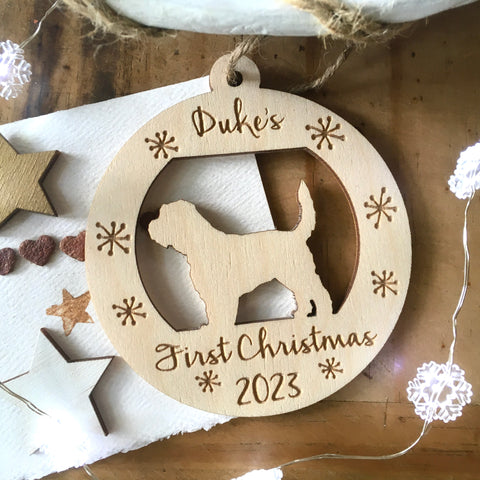 personalized puppy's first Christmas ornament round with golden doodle silhouette