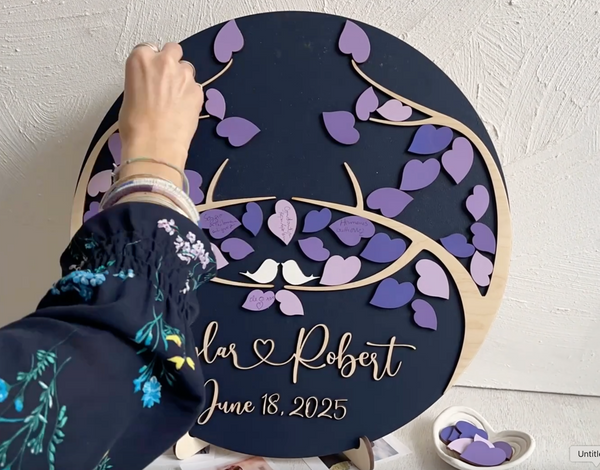 Each guest signs one leaf and places the magnetic leaf on the magnetic board. 