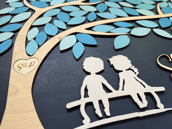 two kids under a tree and heart initial engraved in tree