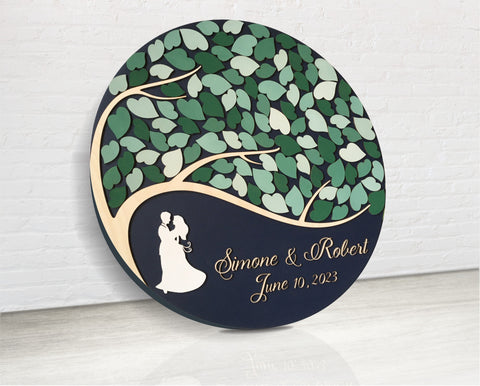 couple under tree of wishes wedding or anniversary guest book