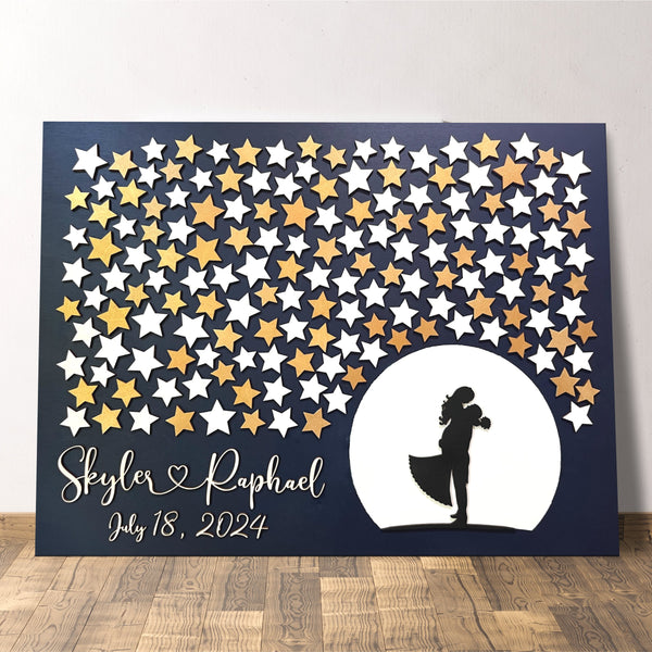 wedding guest book alternative made in 3D wood with a manually painted moon and a couple silhouette embracing against the moon with stars for wedding guests to sign