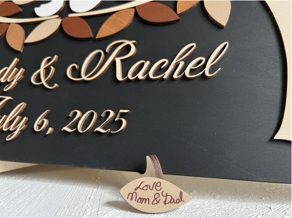 detail of a signed magentic leaf for a magnetic guest book alternative with persoanlized na