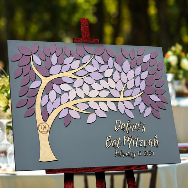 side view of bat mitzvah guest book alternative with tree and logo