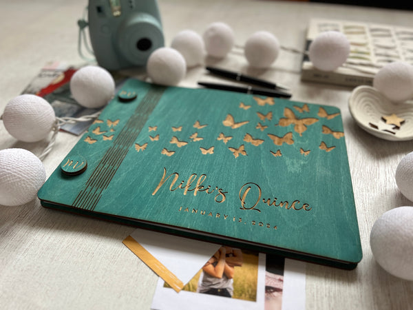 quince or graduation guest book album teal with butterflies and personalized engraved details on wood covers