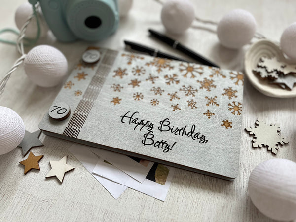 Classic guest book for winter birthday or retirement personalized with names, date and engraved snowflakes, 70th birthday gift
