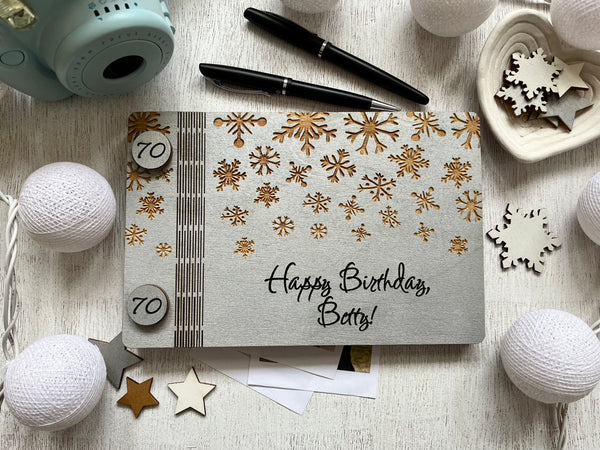 Classic guest book for winter birthday or retirement personalized with names, date and engraved snowflakes, 70th birthday gift