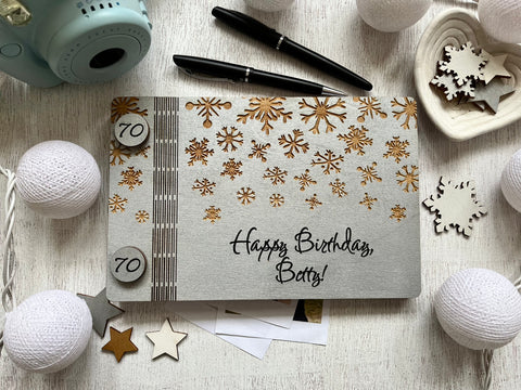 Classic guest book for winter birthday or retirement personalized with names, date and engraved snowflakes, 70th birthday gift
