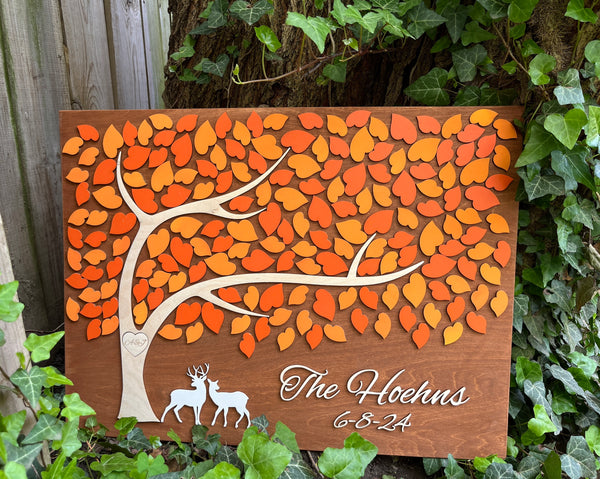 wedding guest book alternative with orange leaves for fall themed wedding